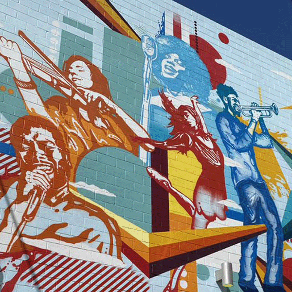 THAC mural showing musicians in bright colors